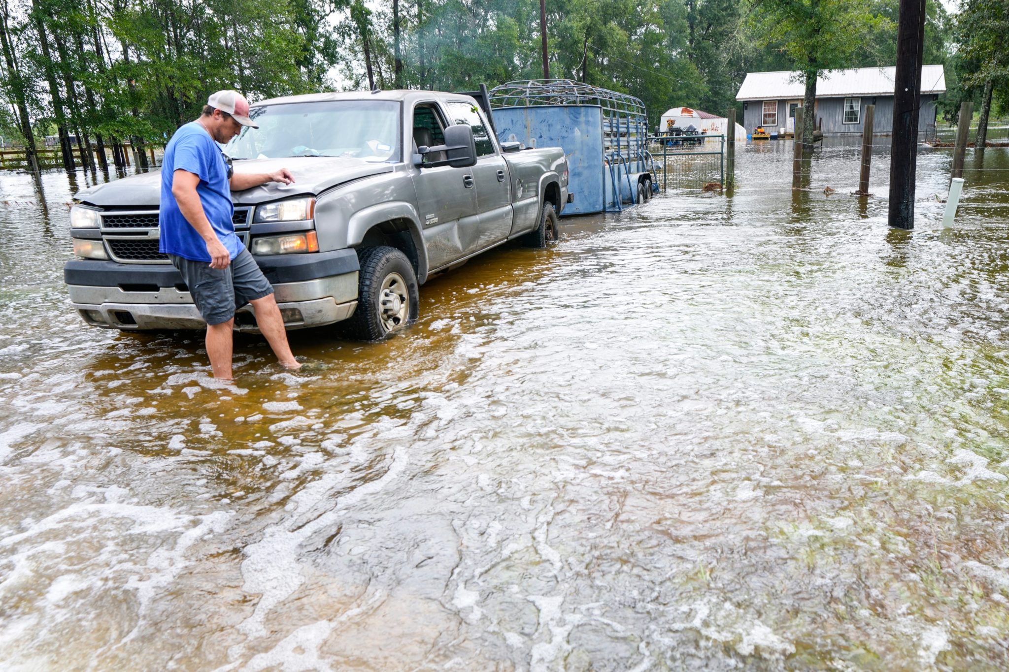 Texas evacuates an assisted living facility as flooding from Tropical Storm Edouard strands drivers and cuts power