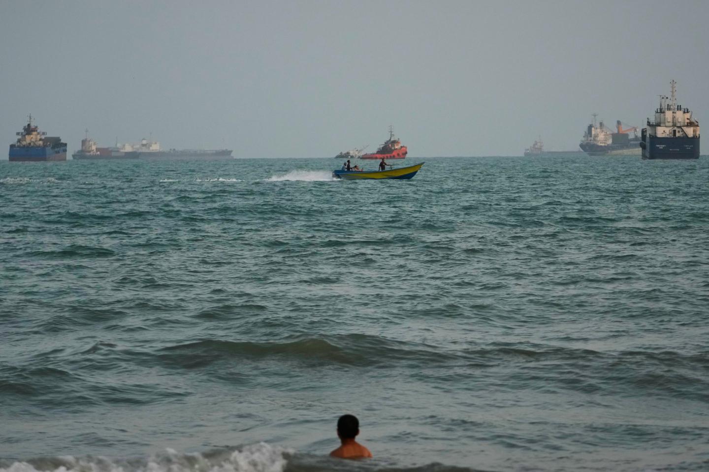 U.S. military strikes Iranian tankers and warns it will destroy Tehran’s oil fleet if necessary after Navy aircraft carrier and destroyer are targeted