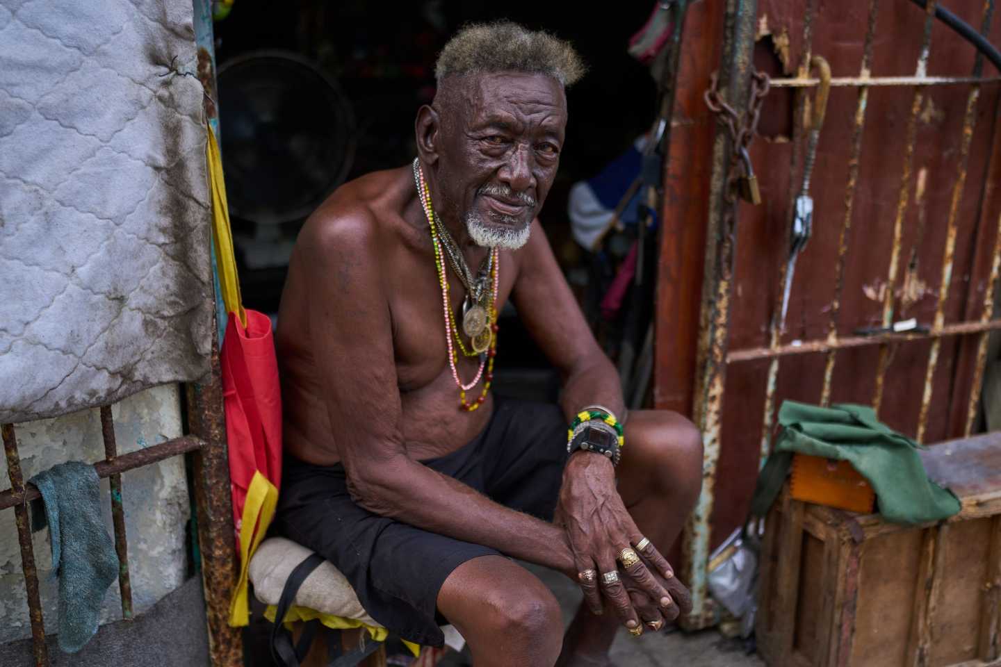 Oscar Joaquín López poses for a photo at the entrance of him home in Havana, Cuba.