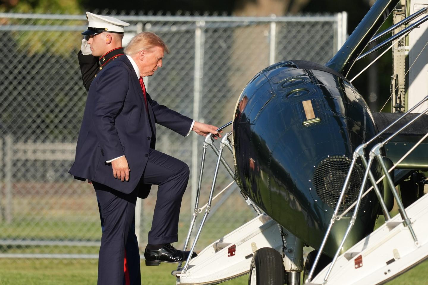 President Donald Trump boards Marine One on the Ellipse near the White House, Friday, Sept. 18, 2026.