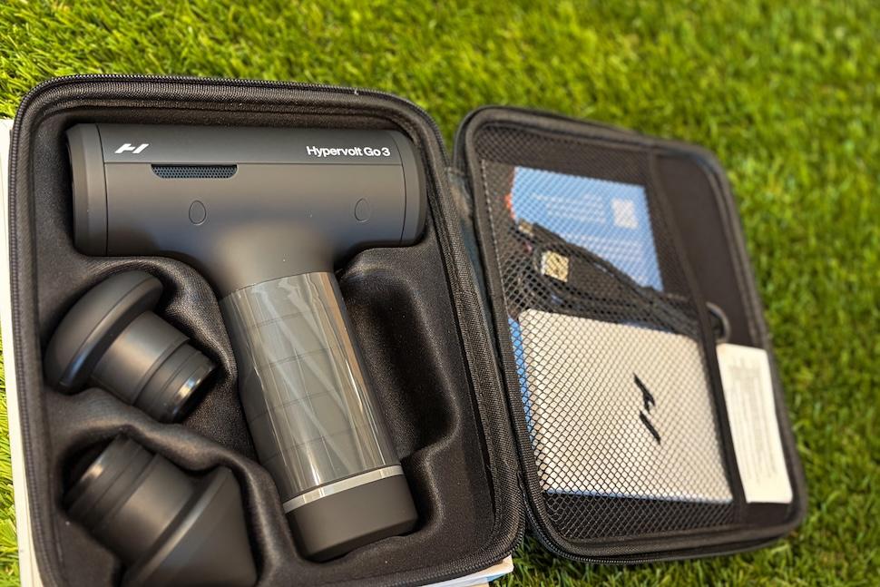 Open travel case showing the Hyperice Hypervolt Go 3 and its attachments