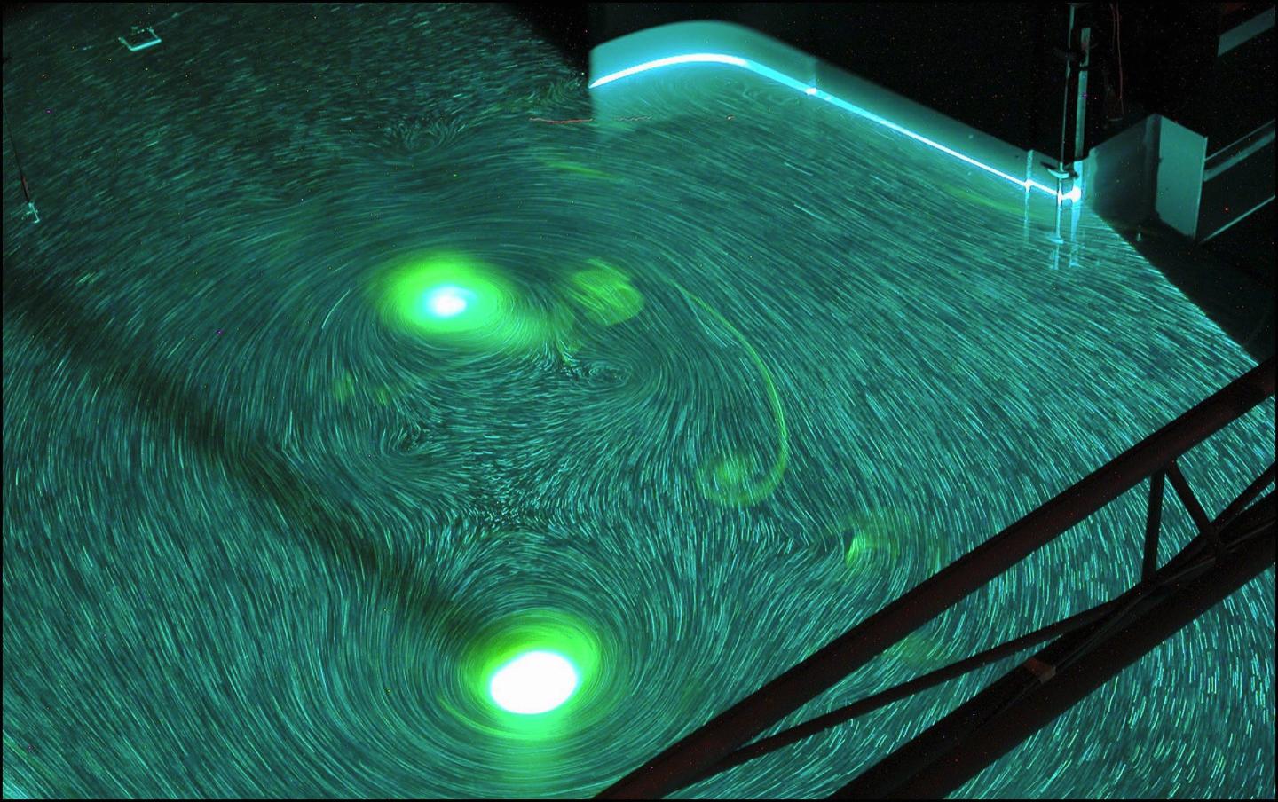 Image of an experiment involving lasers to measure simulated hurricanes.