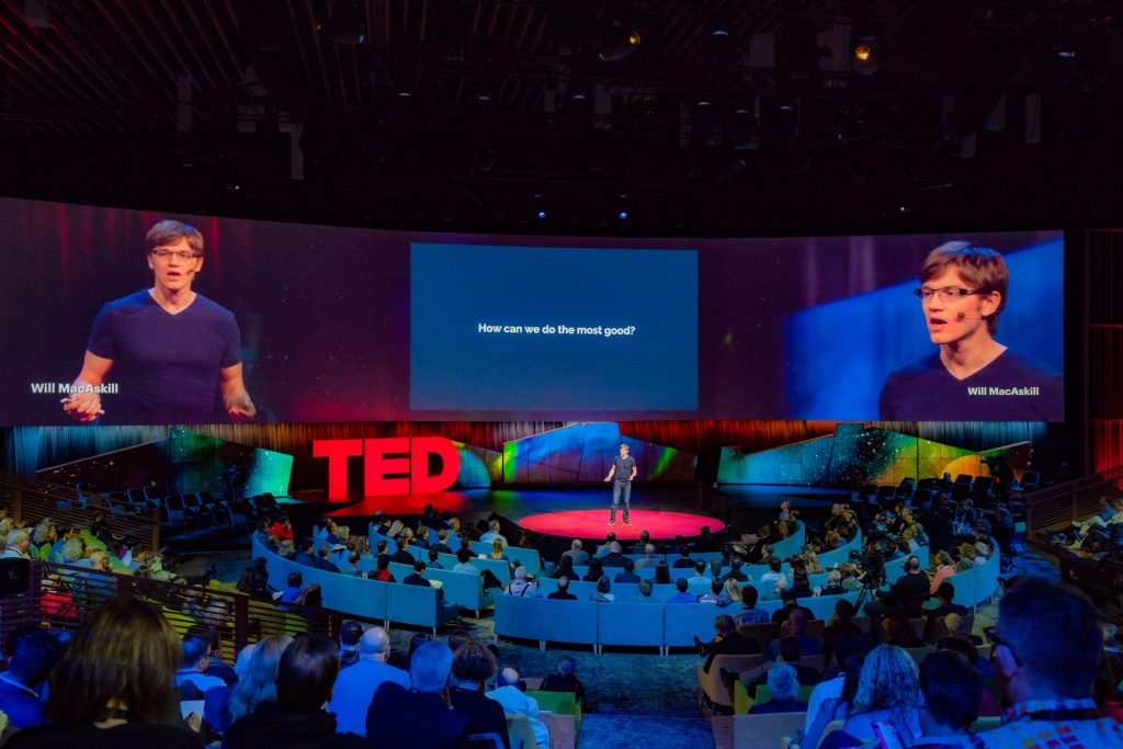Will MacAskill, a cofounder of Effective Altruism, giving a Ted Talk in 2018.