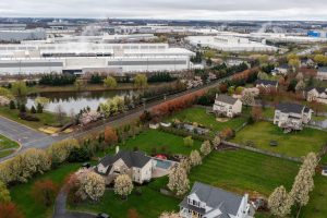 US Economy Sees Spending Shift From Housing to AI Hardware