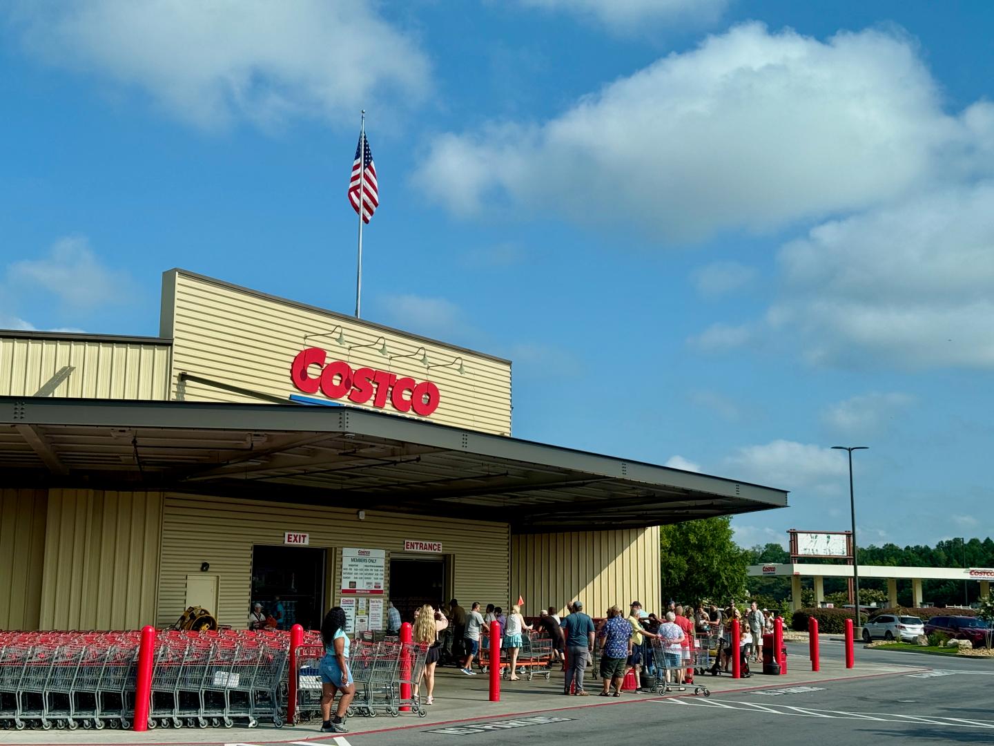 Ringgold, Georgia, USA - August 22, 2025: People wait to enter the Costco warehouse in the morning when the store just opens. Inflation has forced Costco to raise its prices on some items but its reputation still attracted a lot of customers.