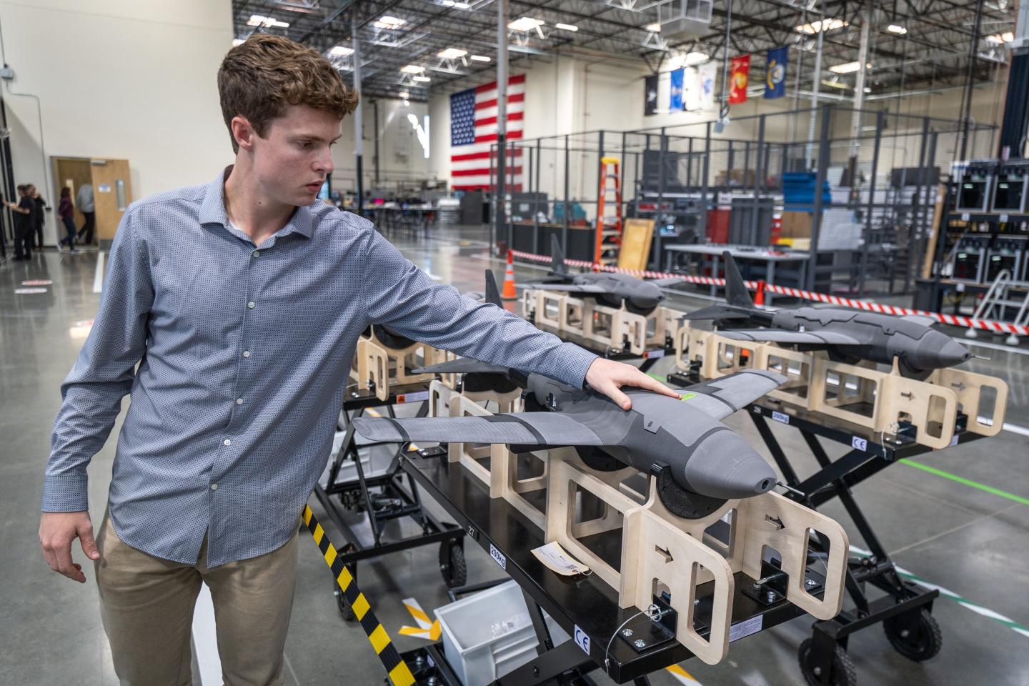 Ethan Thornton views production of the Glide, a high-altitude glider.