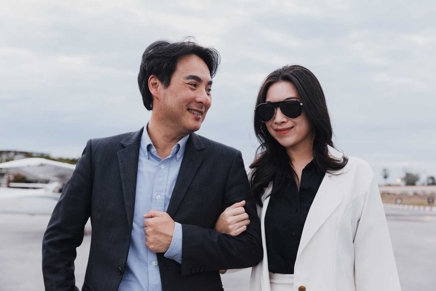 Rich couple walking