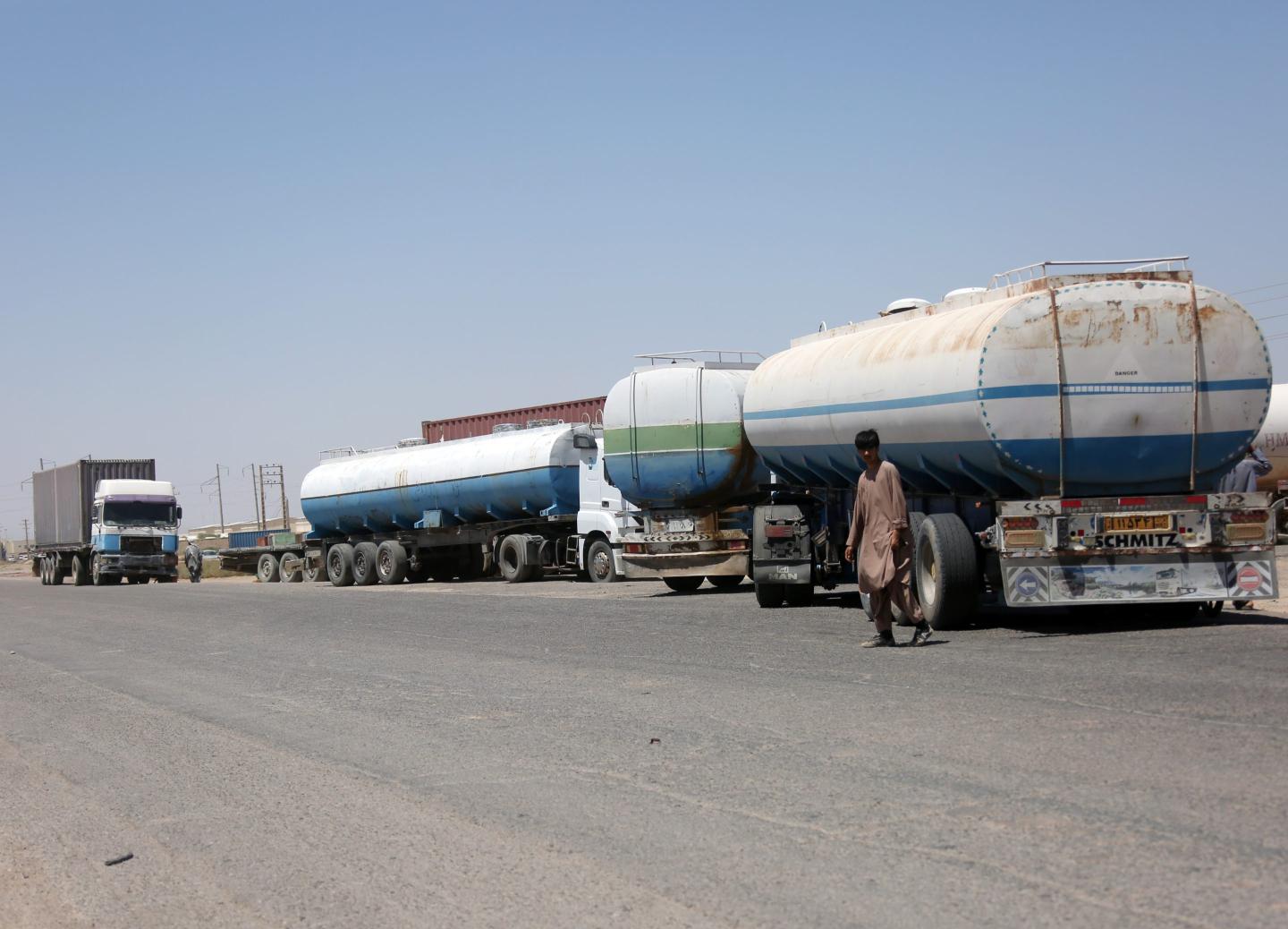 Commercial tanker trucks along the Iran-Afghanistan border at Herat's Islam Qala crossing on Aug. 10, 2026.