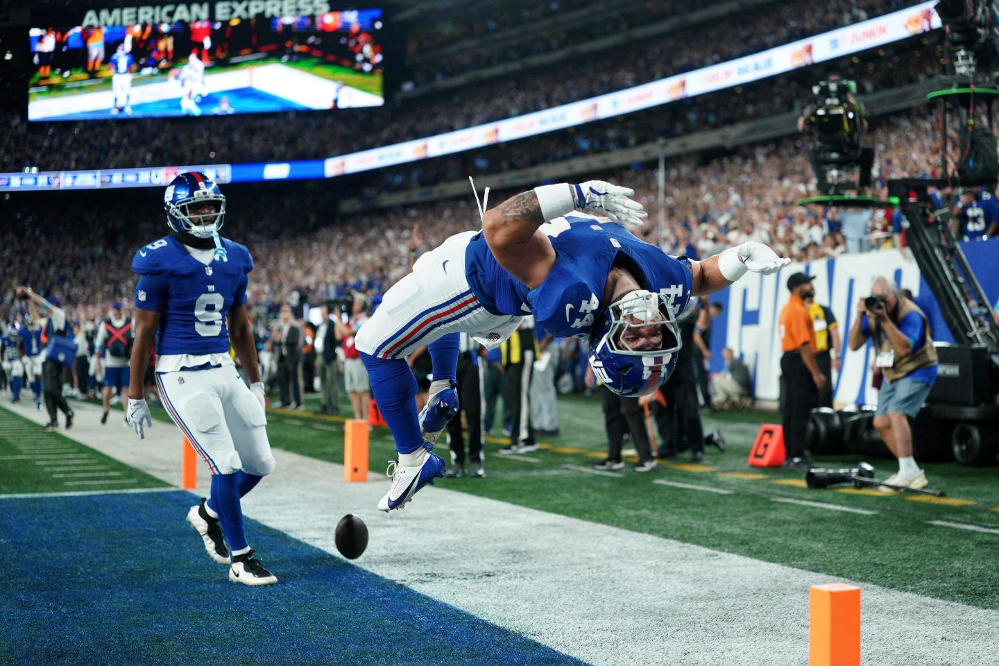 Cam Skattebo #44 of the New York Giants celebrates a touchdown during the first quarter against the Dallas Cowboys at MetLife Stadium.