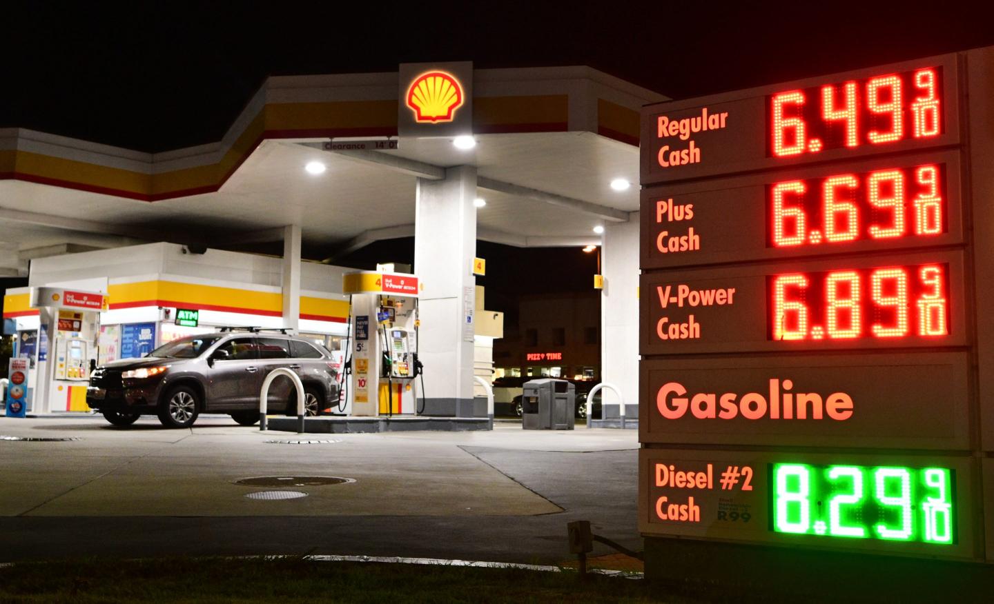 Gasoline and diesel prices are displayed at a gas station in Los Angeles, on September 22, 2026. US President Donald Trump expressed support Tuesday for a diesel export ban, with fuel prices having surged on the back of the Middle East war.