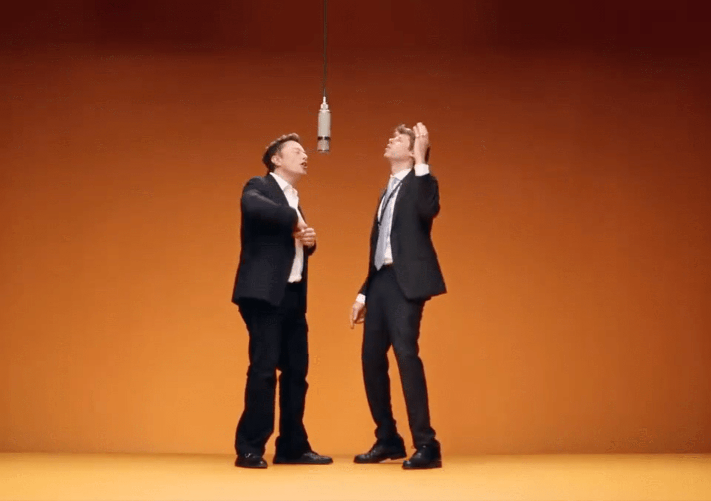 Elon Musk and Sam Altman rapping to a trap track in a screenshot of an AI-generated video.