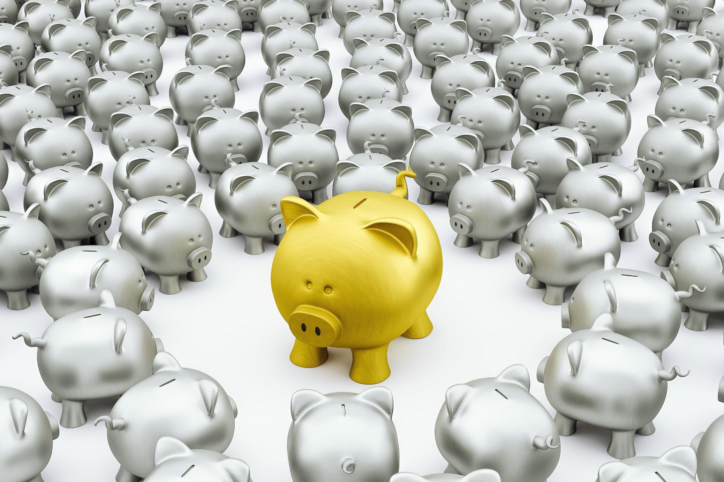 A gold piggy bank surrounded by smaller silver ones.