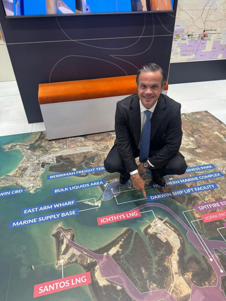Formentera Partners and Daly Waters founder Bryan Sheffield crouches over a map of the liquefied natural gas export facilities in Australia that gas from the Beetaloo Basin could service.