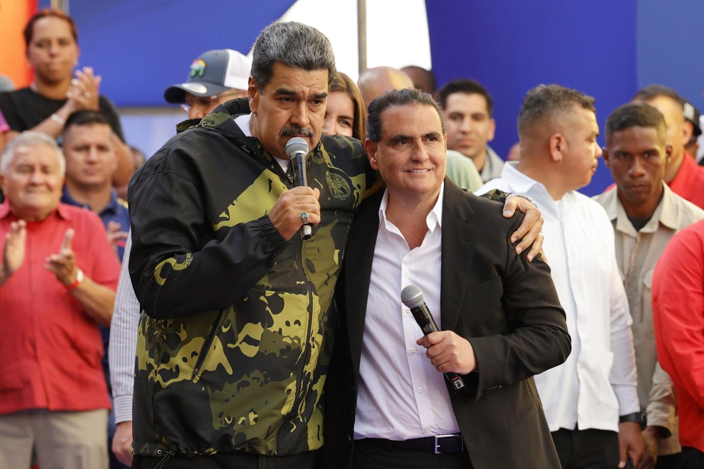 Venezuela's President Nicolas Maduro, left, and Alex Saab stand together during an event marking the anniversary of the 1958 coup that overthrew dictator Marcos Perez Jimenez, in Caracas, Venezuela.
