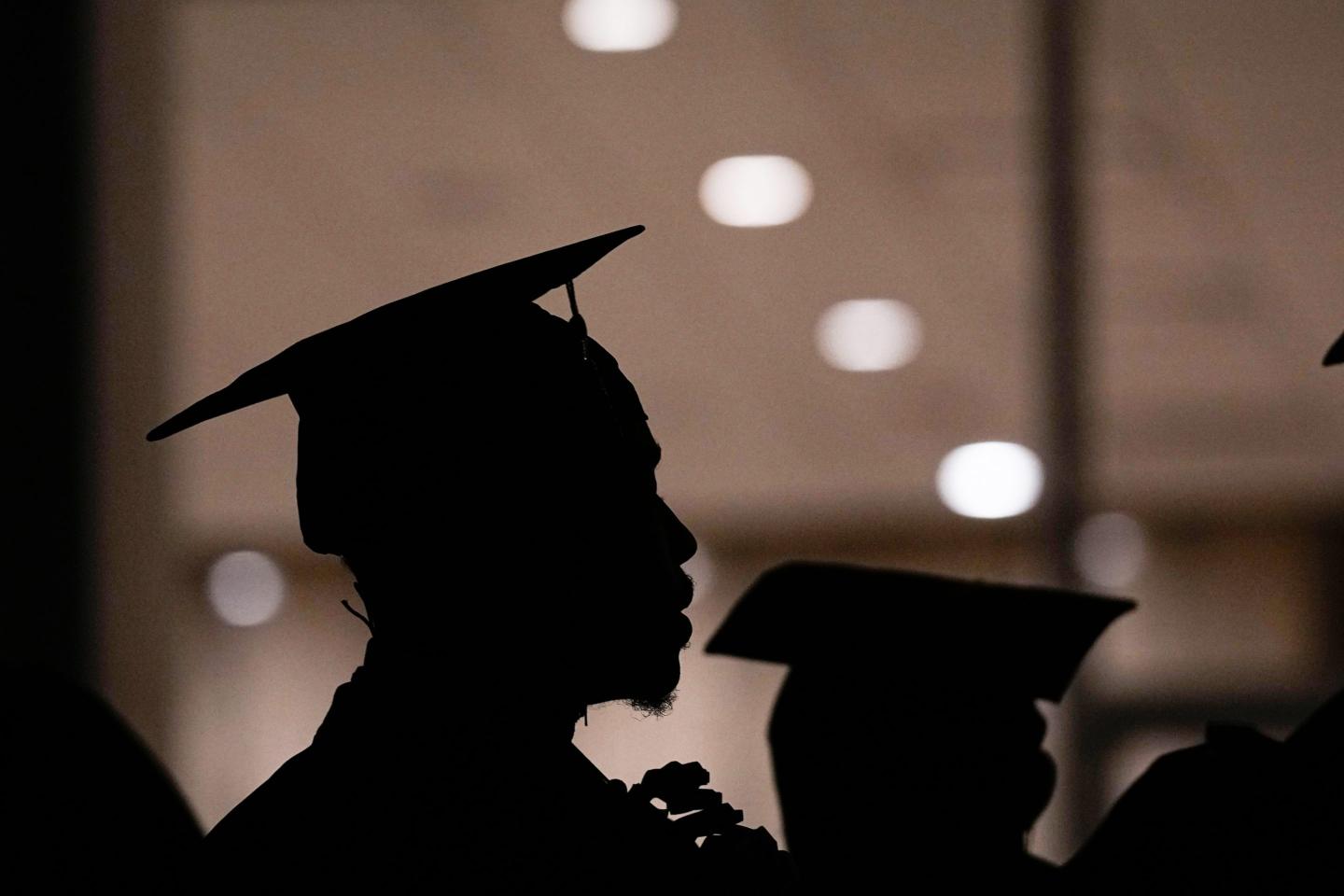 A Morehouse College student lines up before the school commencement, May 19, 2024, in Atlanta.