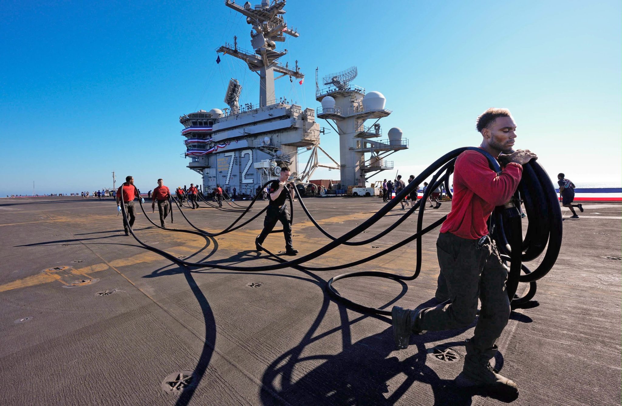 USS Abraham Lincoln returns to San Diego after 265 straight days at sea, food shortages and reports of deteriorating morale