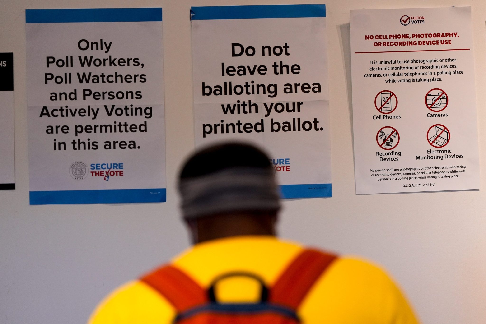 Democrats train tens of thousands of poll watchers as the Justice Department plans its largest-ever Election Day monitoring