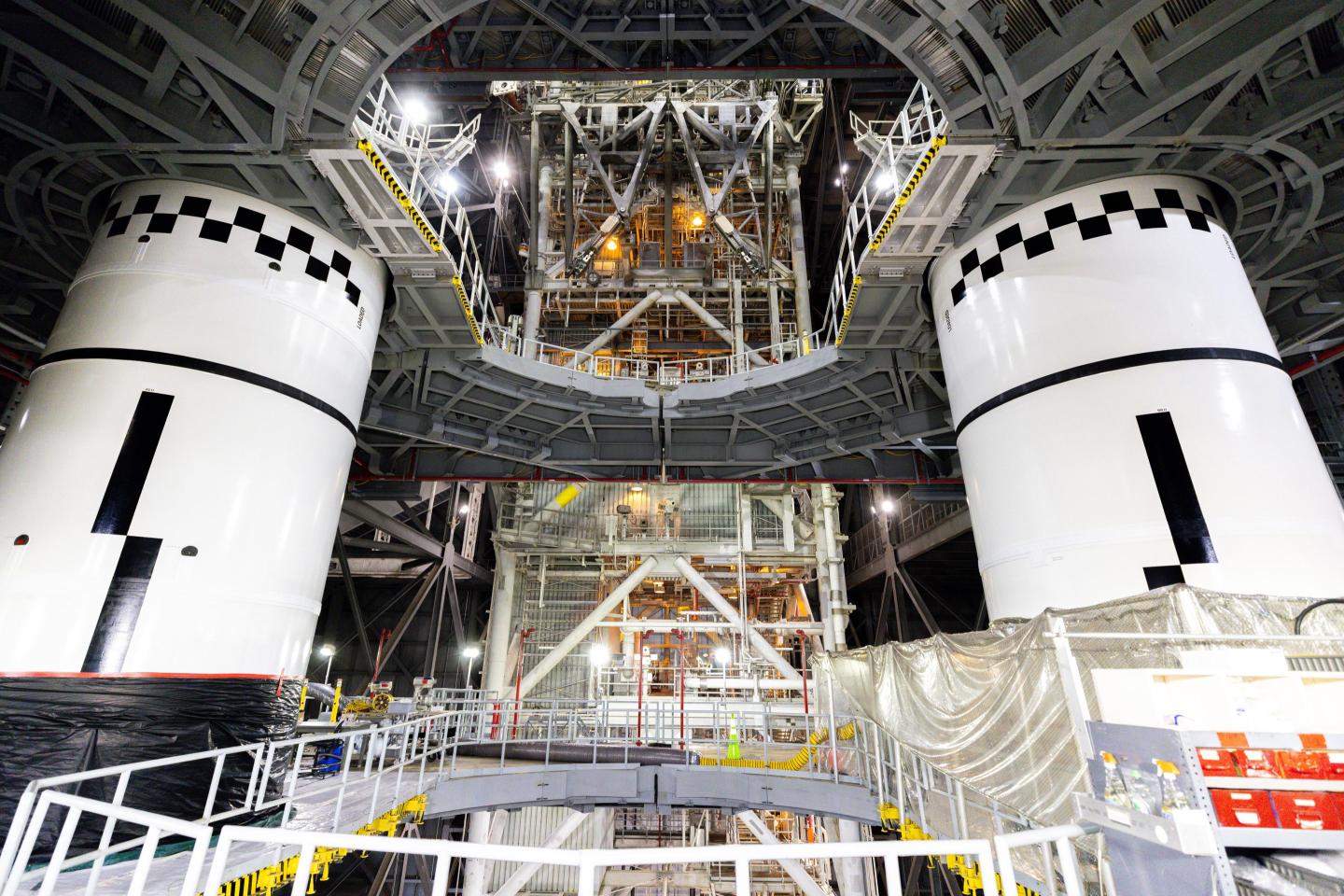 The final left and right forward solid rocket booster motor segments for Artemis III are integrated onto the mobile launcher for the SLS (Space Launch System) rocket on Thursday, Sept. 24, 2026 at NASA's Kennedy Space Center in Florida.