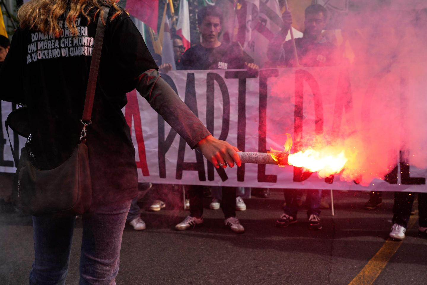 Members of right-wing student groups march through the streets of Rome, Saturday, Oct. 24, 2026.