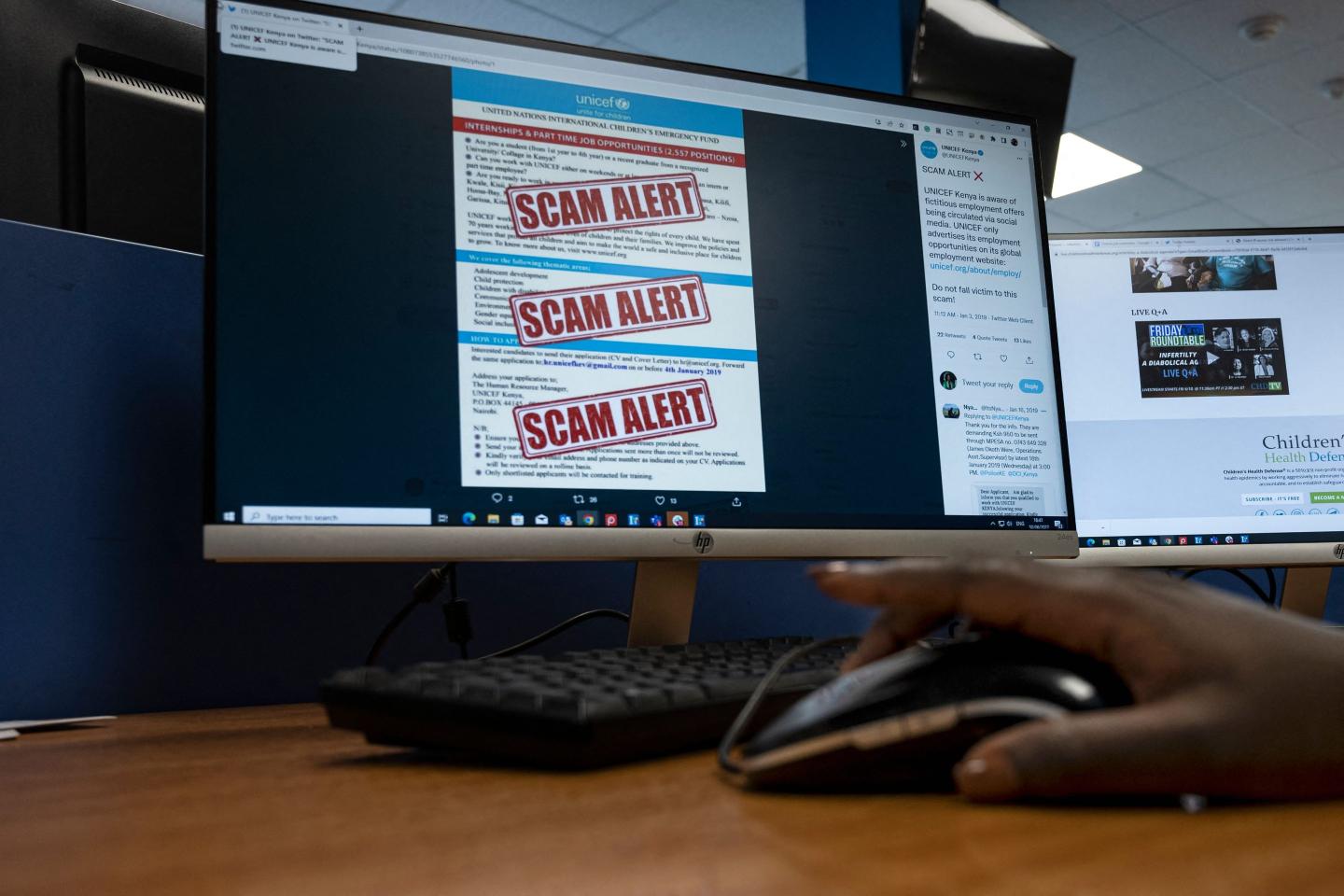 A researcher browses an internet site with a job offer for a United Nations agency that has been flagged as a scam in Nairobi on June 30, 2022. A report by Code for Africa revealed that in 2020 when job losses soared during the Covid-19 pandemic 33 scam recruitment Facebook accounts, groups and pages with more than 184,000 followers targeted people in Kenya, requiring them to send about 350 Kenyan shillings ($3) before placements that never materialised. Syndicates behind these scams rely on the desperation of job seekers who fail to double-check the authenticity of job postings and send money without hesitation to secure employment, said Kenyan cyber security expert Anthony Muiyuro.