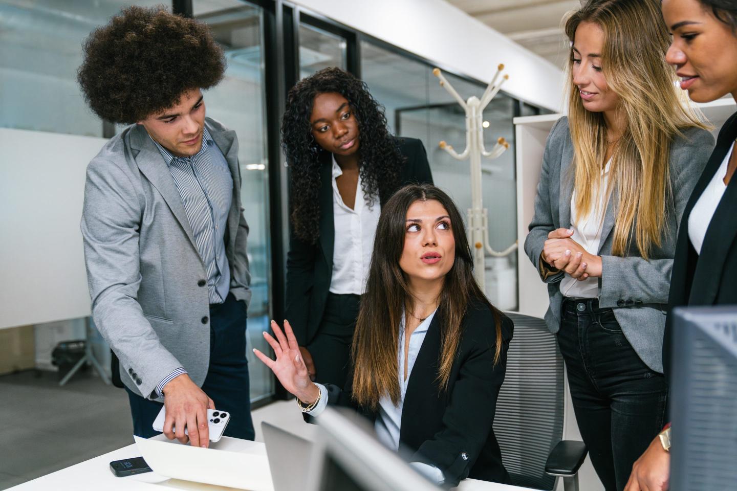 Young employees work in team