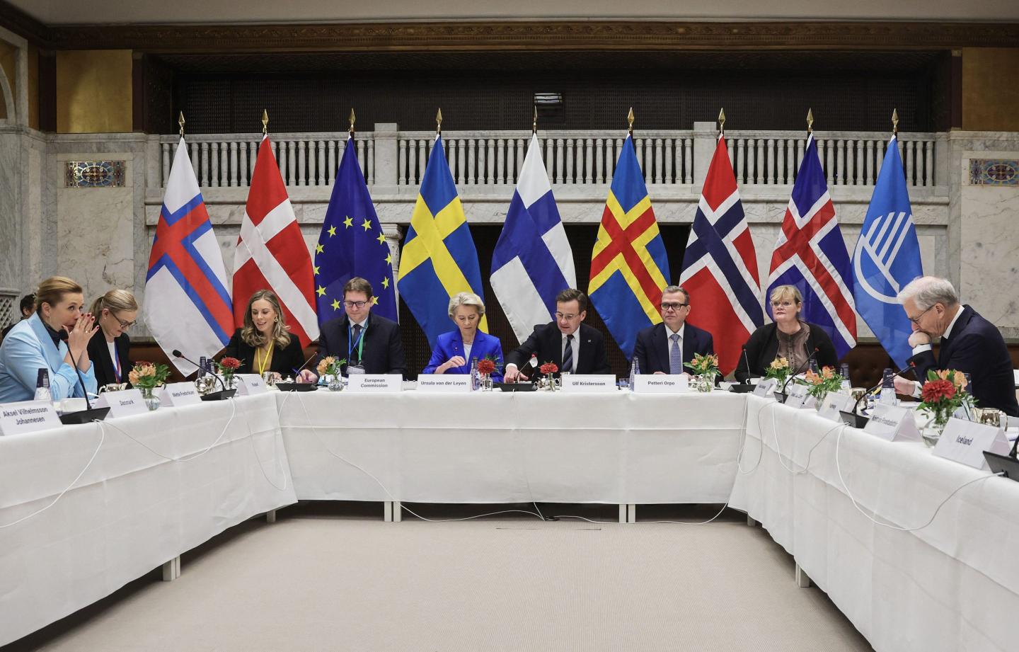 Denmark's Prime Minister Mette Frederiksen (L), Sweden's Minister for EU Affairs Jessica Rosencrantz (3rdL), European Commission President Ursula Von der Leyen (C), Sweden's Prime Minister Ulf Kristersson (4thR), Finland's Prime Minister Petteri Orpo (3rsR), Aland County Councillor Katrin Sjogren (2ndR) and Norway's Prime Minister Jonas Gahr Store (R) sit at the start of the 77th session of the Nordic Council in Stockholm on October 28, 2025.