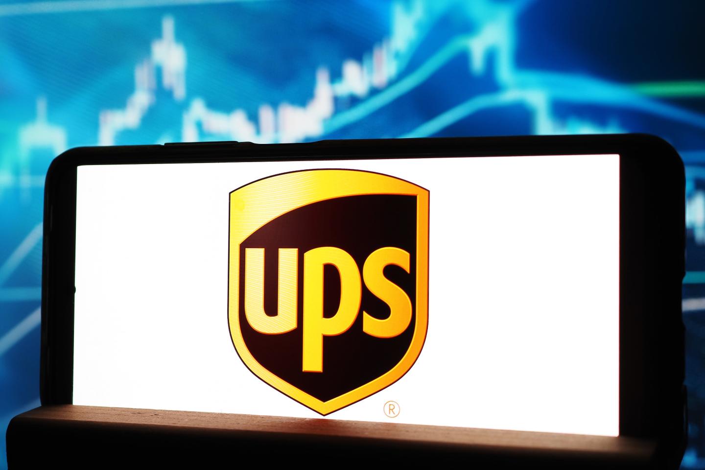 In this photo illustration, the United Parcel Service, Inc. (UPS) logo