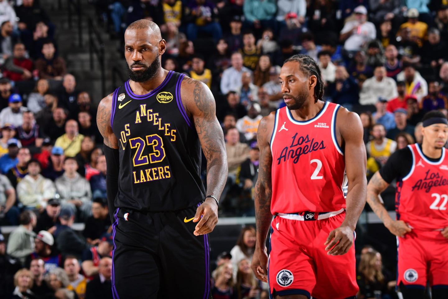 LeBron James #23 of the Los Angeles Lakers and Kawhi Leonard #2 of the LA Clippers looks on during the game.