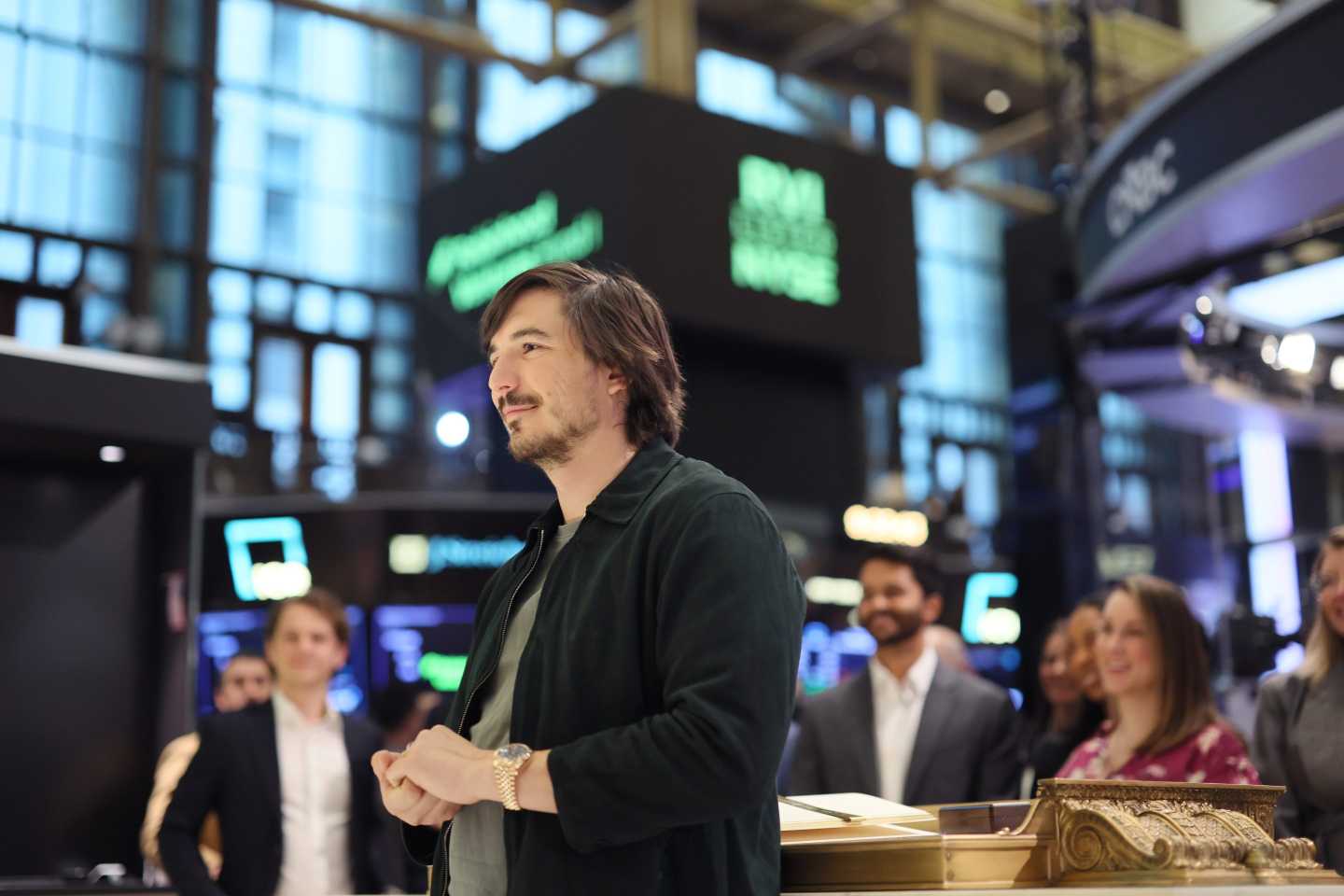 Robinhood CEO Vlad Tenev stands on the floor of the New York Stock Exchange.