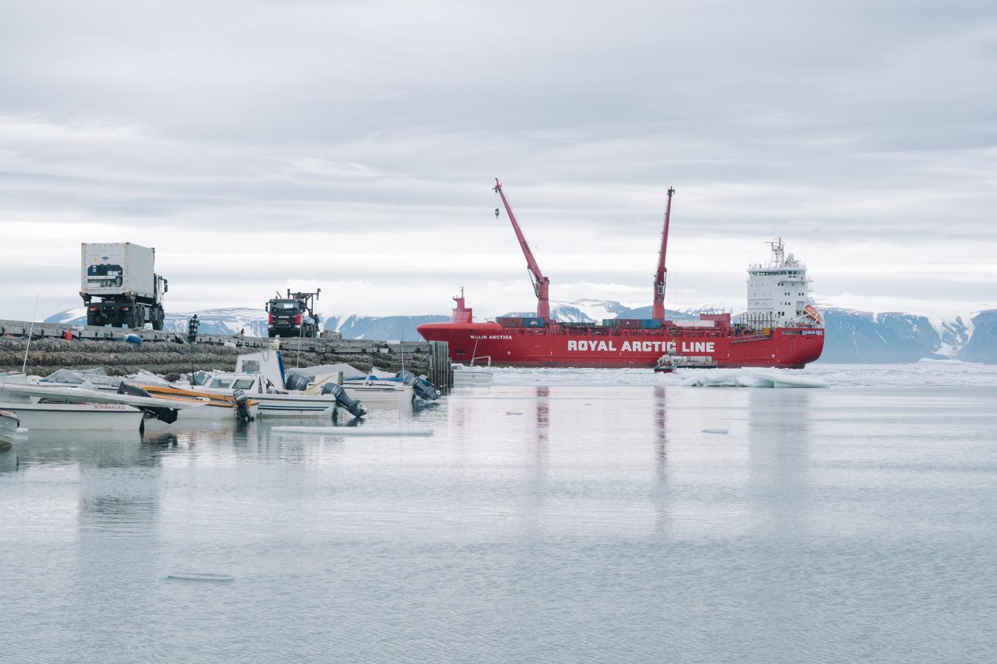 A supply ship, operated by Royal Arctic Line A/S, the first to arrive after the break-up of sea ice in the town of Qaanaaq, northwestern Greenland.