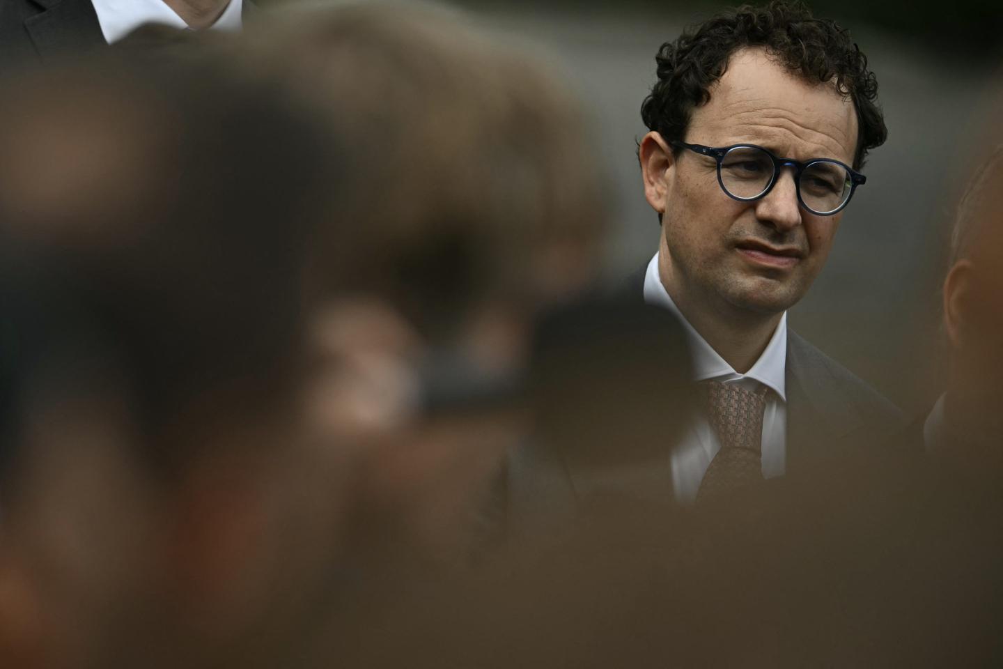 Anthropic co-founder and CEO Dario Amodei looks on as President Donald Trump speaks to the press after a meeting with technology executives about AI at the White House on Sept. 29, 2026.