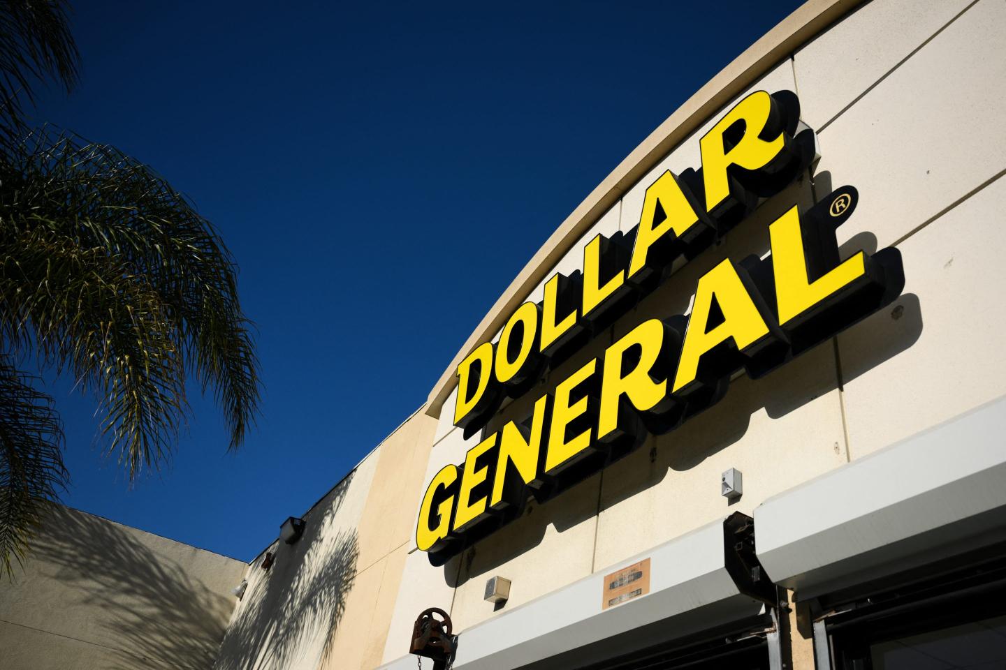 Signage is displayed outside of a Dollar General discount store in Inglewood, California.