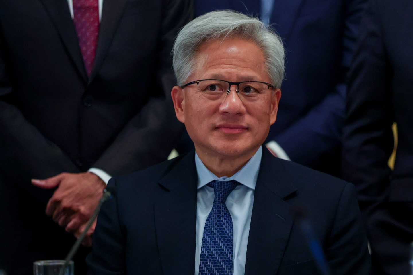 Nvidia CEO Jensen Huang attends a meeting on artificial intelligence in the East Room of the White House.