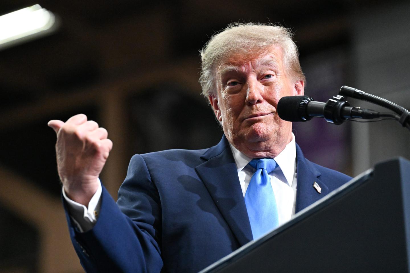 U.S. President Donald Trump speaks on stage at the Butler-Vandalia Student Activity Center during a campaign rally.