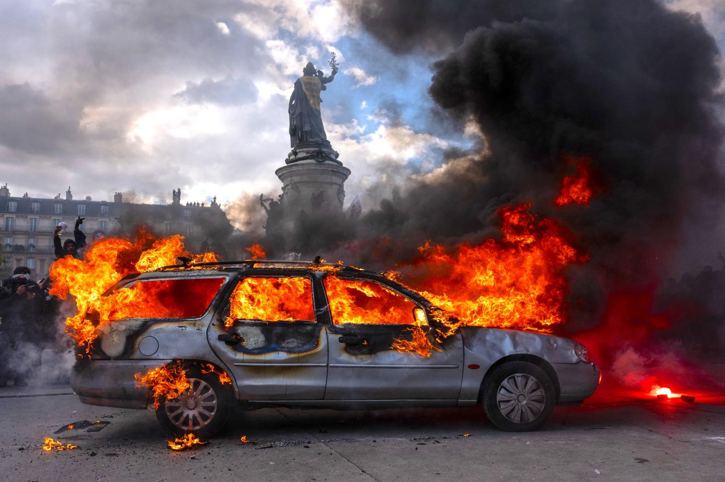 Photo: A burning car on the streets of Paris.