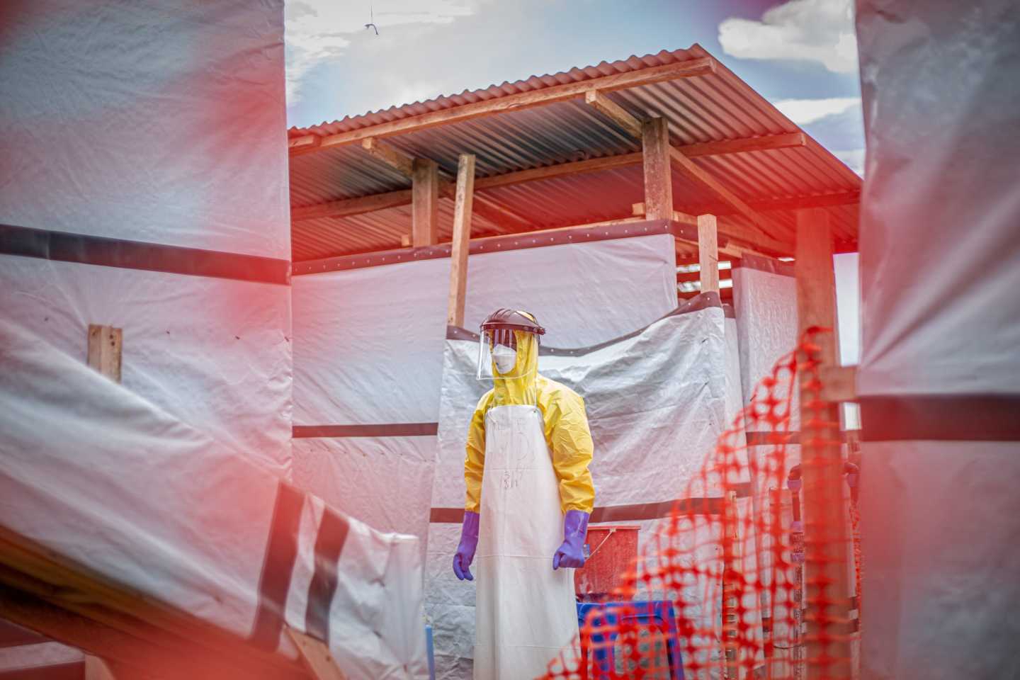 A medical worker patrols at an Ebola treatment center in Bunia, capital of Ituri Province in the Democratic Republic of the Congo.