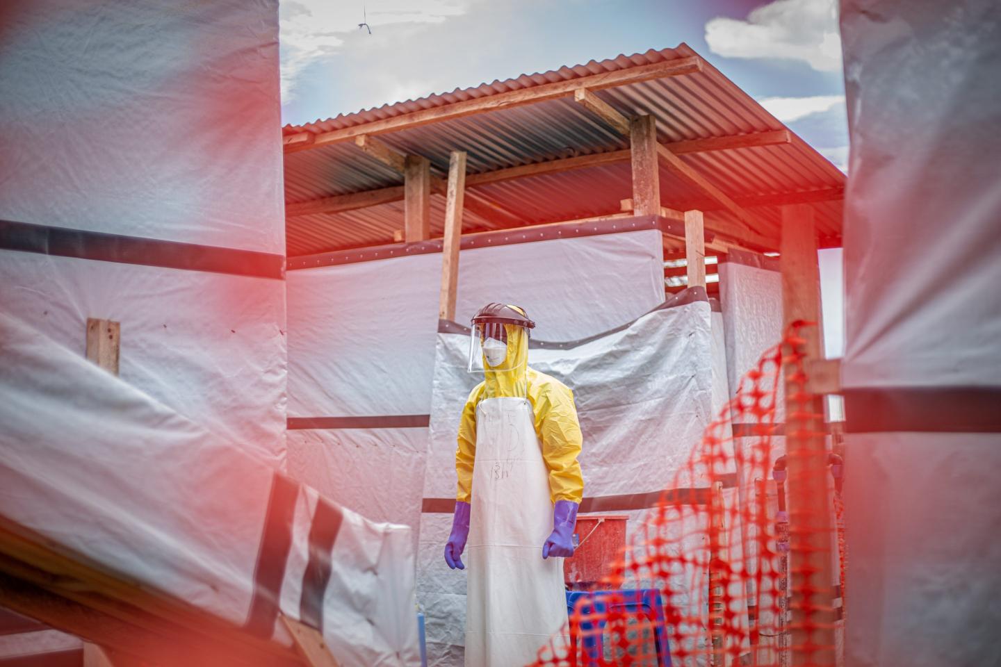 A medical worker patrols at an Ebola treatment center in Bunia, capital of Ituri Province in the Democratic Republic of the Congo.