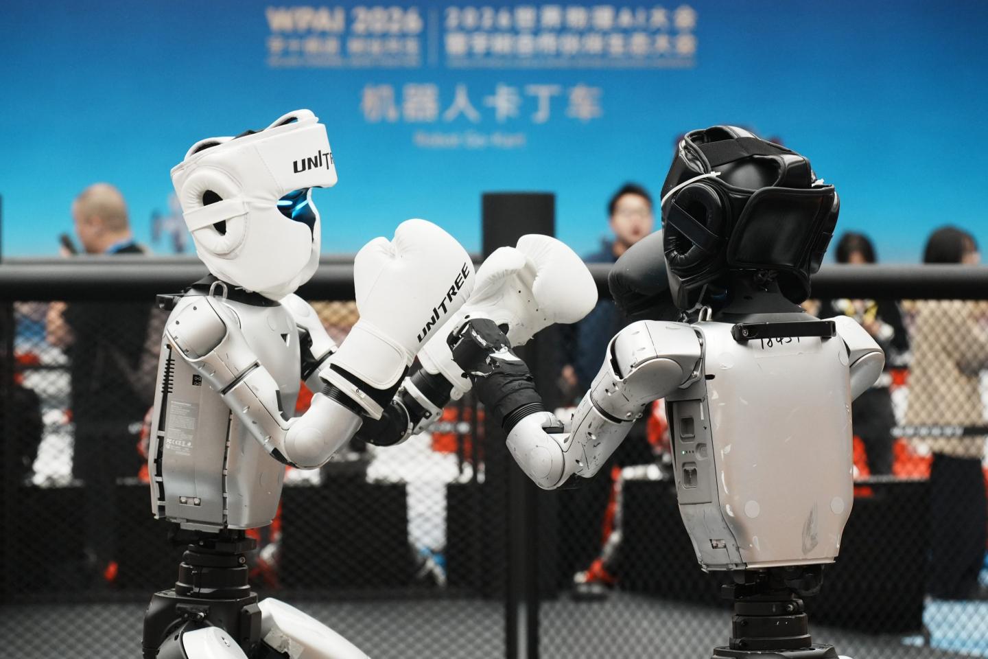 A Unitree G1 humanoid robot competes in robot combat at the 2026 World Physical AI Conference in Hangzhou, Zhejiang Province, China, on October 22, 2026. 
