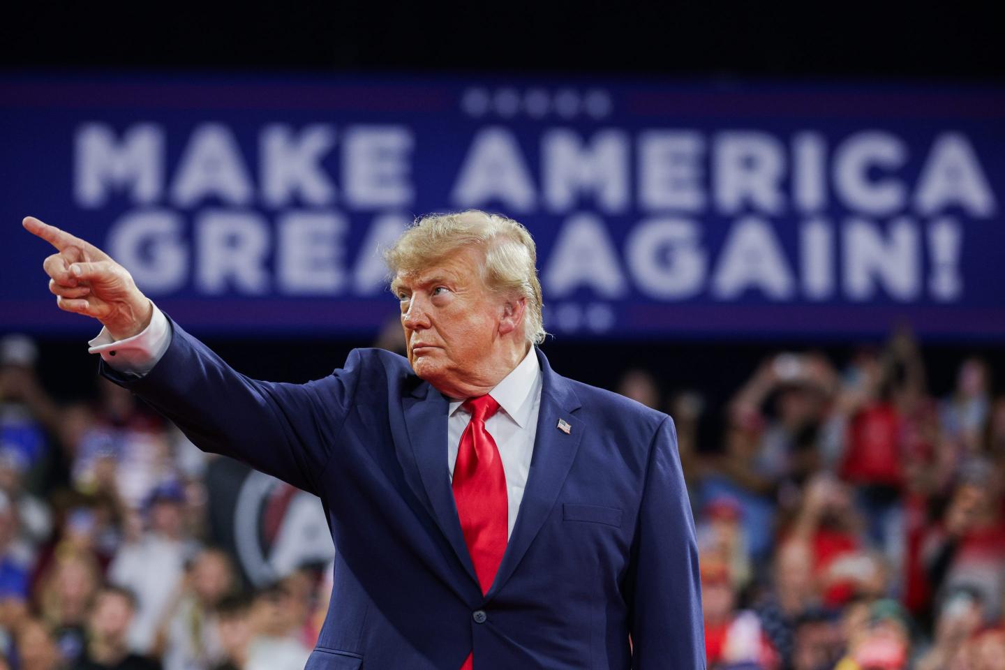 U.S. President Donald Trump gestures to the crowd as he arrives to an election rally at Alico Arena on the Florida Gulf Coast University campus on October 23, 2026 in Fort Myers, Florida.
