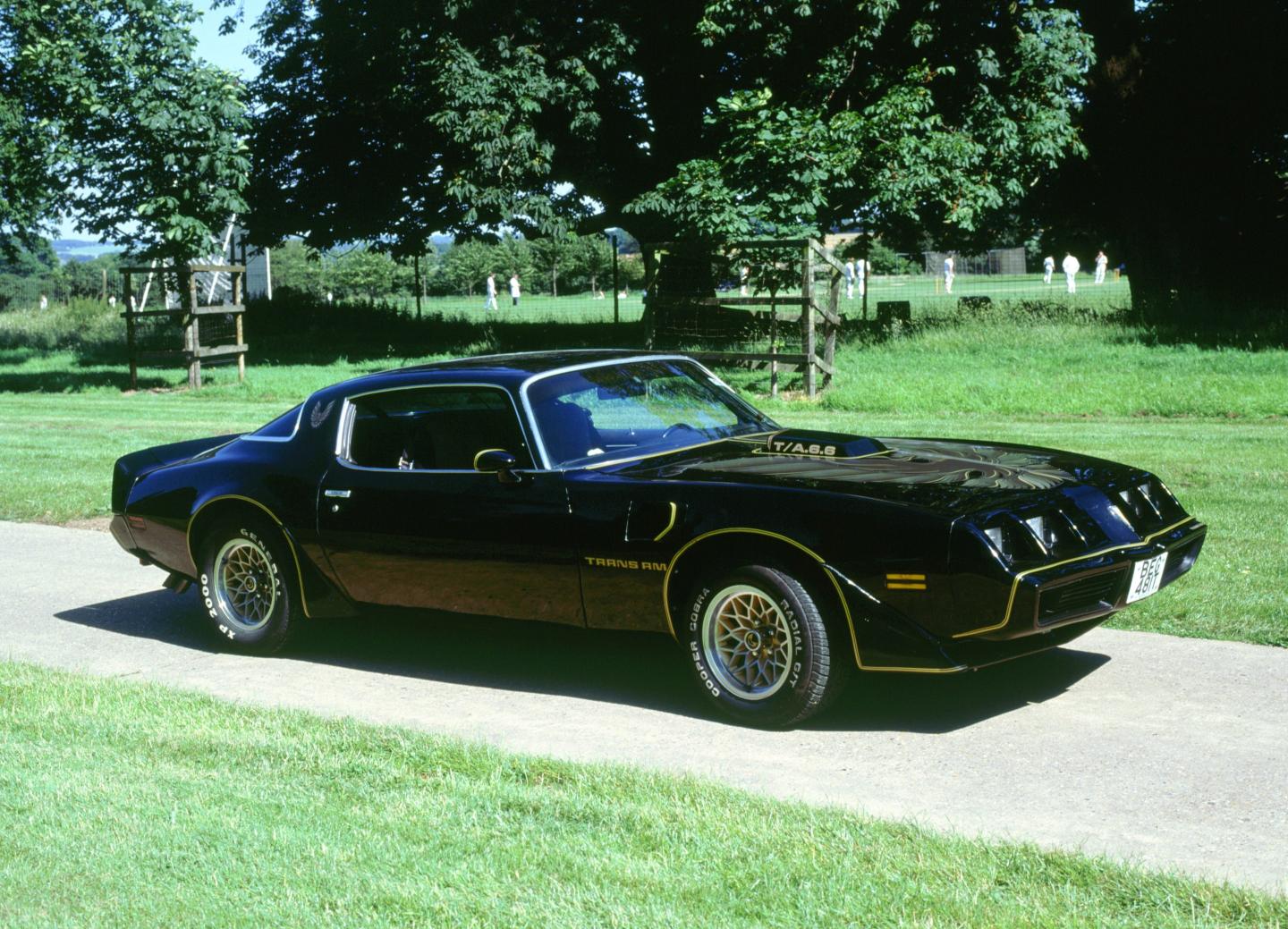 Federal prosecutors seized a Pontiac Firebird and 90-plus other cars. 