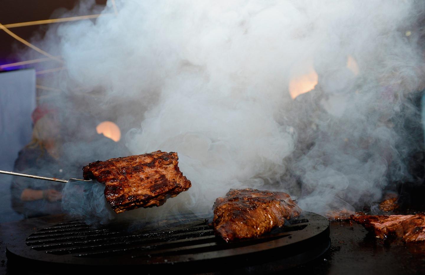 Beef sirloin is grilled on an Arteflame grill.