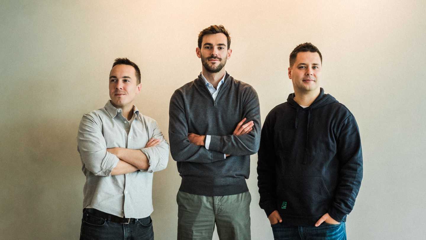 Philipp Burda (left), Mark Swan (middle), and Ivan Chalov (right) smile at the camera.
