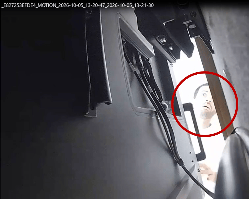 Abdulrahman Alfozan is seen here caught on camera attempting to retrieve the recording device.