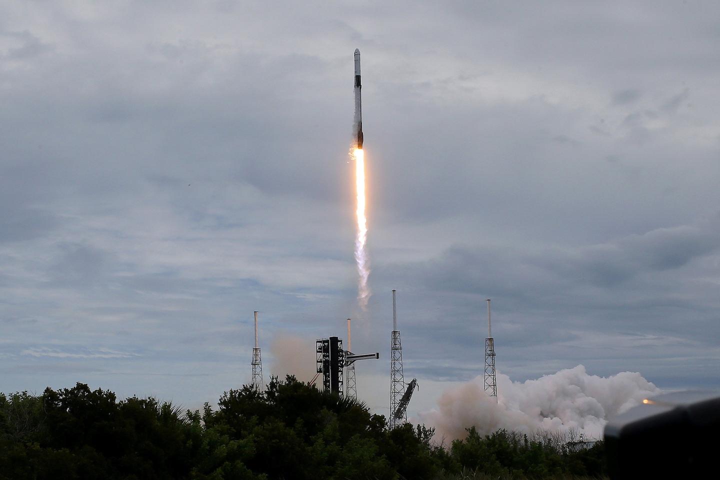 A SpaceX Falcon 9 rocket lifts off from Cape Canaveral